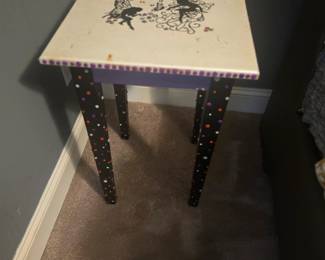 Whimsical square side table with fairy motif and colorful dotted legs. Great for a child’s room or creative space.
Approx. 18”W x 18”D x 24”H.
