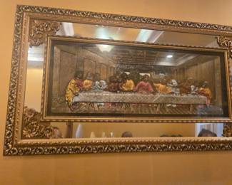 Beautiful 3D relief-style depiction of The Last Supper set in a gold-toned ornate frame with floral and scroll detailing. The piece has a textured surface and reflective insets that give depth and sophistication to any room.
Frame dimensions (approx.): 36" W × 20" H.