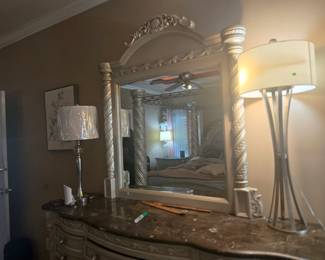 Large 9-drawer dresser with marble-look top and matching framed mirror. Approx. 72” W x 20” D x 80” H (with mirror).