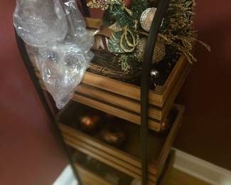 Metal and wood three-tier shelf stand, perfect for plants or decorative storage. Approx. 36"H.