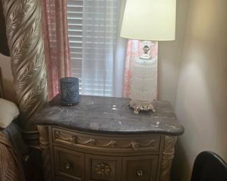 3-drawer nightstand with marble-look top and carved detailing. Approx. 30” W x 18” D x 30” H.