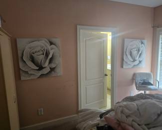 Pair of large grayscale rose canvas prints. Adds a sophisticated, romantic touch to any space. Sold as a set.
Each approx. 24” x 24”