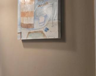 Charming canvas art featuring a soft-toned bathroom scene. Adds a relaxing, spa-like feel to any space. Approx. 16” H x 12” W.