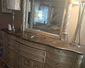 Large 9-drawer dresser with marble-look top and matching framed mirror. Approx. 72” W x 20” D x 80” H (with mirror).
