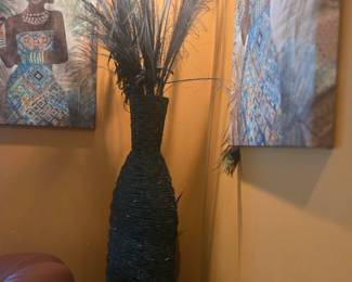 Tall dark woven vase with elegant peacock feathers and dried floral arrangement. Adds height and texture to any corner space. Approx. 48"H.