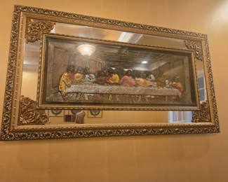 Beautiful 3D relief-style depiction of The Last Supper set in a gold-toned ornate frame with floral and scroll detailing. The piece has a textured surface and reflective insets that give depth and sophistication to any room.
Frame dimensions (approx.): 36" W × 20" H.