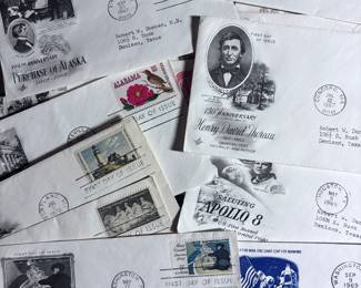 Dozens and dozens of first day of issue U.S. and Canada stamp covers