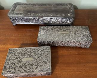 A few of the embossed metal boxes