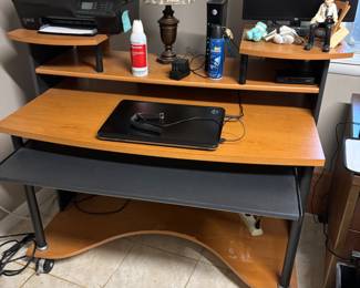 Modern desk on castors keyboard pull out $90.00.  52”w 27.5”d 40.5”t