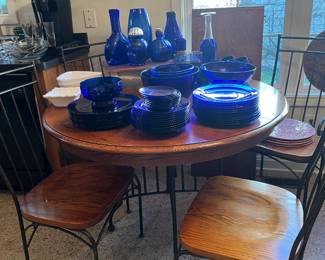 Nice table and chairs and Blue Glass dishes