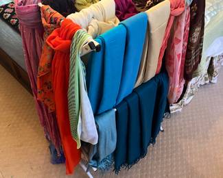 Many many scarfs. Silk, cashmere cotton , wool and more .. 