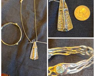 Stunning cross necklace by Hagit Gorali . Bracelet by the same designer.