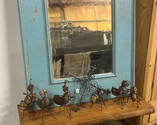 Large mirror and yard ornaments