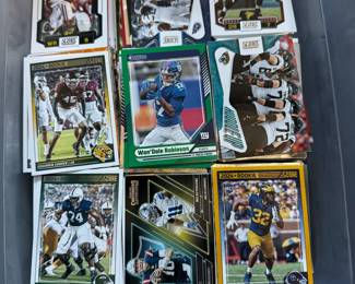 Hundreds of baseball, football, and basketball cards — a great find for collectors!