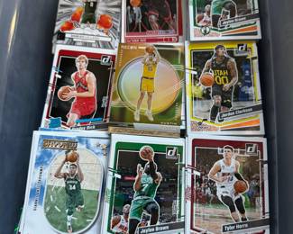 Hundreds of baseball, football, and basketball cards — a great find for collectors!