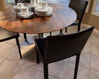 Room and Board Table & 4 Leather chairs we also have 2 barstools Chairs are Madrid