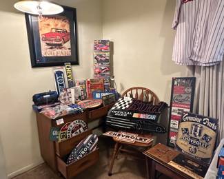Knee Hole Desk; Desk Chairs; Revell & Monogram New Model Kits; Budweiser/ Nascar Neon Sign (Non Working); Dremel; Chevy Signs; Dad and Grandpa Garage Signs; Chevy Thermometer; Geo Tracker Desk Top "trophy"
