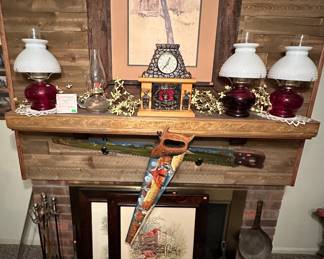 Vintage P & A Dorset Ruby Red Oil Lamp with White Hob Nail Shade; United Fireplace Mantle Clock Light Motion Rooster, Hen, Cauldron; Oil Lamp; Brass Fireplace Tools; Cold Handle #41 Steel Chuckwagon Cowboy Skillet; Unmarked Raised #9 Cast Iron Skillet & #9 Lid; Wagner Ware #8 Cast Iron Skillet 10-1/2 Flat Bottom; Unmarked Cast Iron Dutch Oven with Lid Marked 7 4-4qt; Hand Painted Hand Saws; Wall Pictures