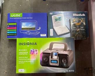 2374  2 Portable DVD Players, Insignia Boombox with iPod Docking Station, and Pacific Rim DVD 
