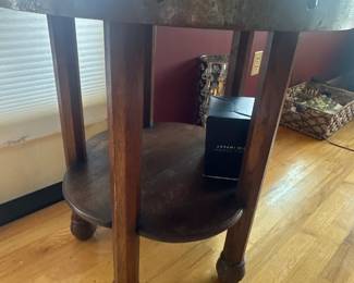 Oval serving table with shelf