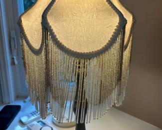 Victorian style table lamp with fringe shade
