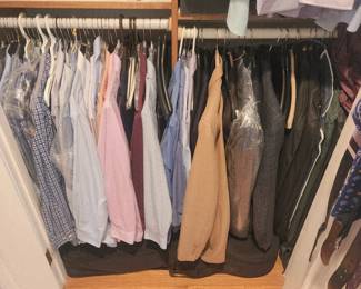Men's clothes. Many ties and belts.