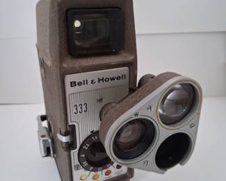 Vintage Bell & Howell movie camera in case.