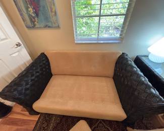 Two Ratan and Upholstered Loveseats with matching coffee table and end table