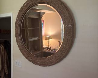 Round carved mirror