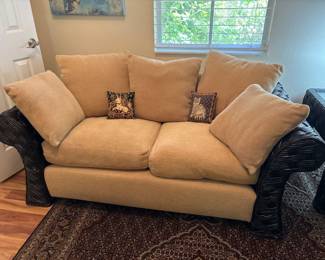 Two Ratan and Upholstered Loveseats with matching coffee table and end table