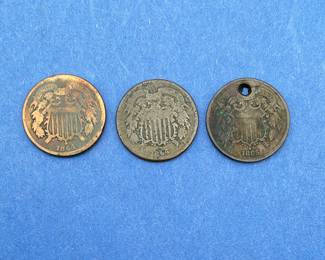 Three US 2 cent pieces