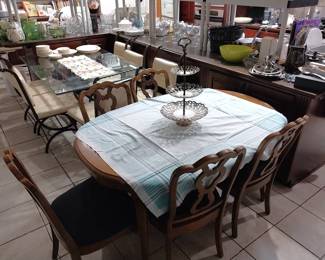 wrought iron and leather barstools, glass top dining table with wrought iron and leather chairs, Thomasville dining table with three leaves and chairs