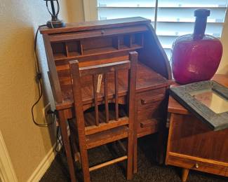 Small wooden roll top desk and chair for a child  