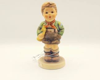 Hummel figurine, specifically "Trumpet Boy" (#97). 