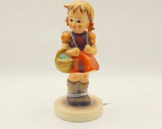 vintage Goebel Hummel "School Girl" figurine.
The figurine is also known by the model number #81/0 and #81 2/0. 