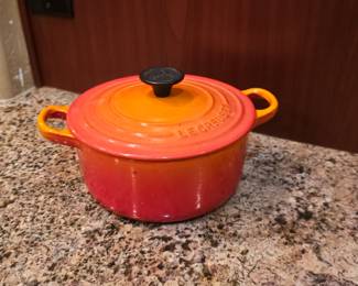 Le Creuset Signature Round Dutch Oven enameled cast iron cookware.
