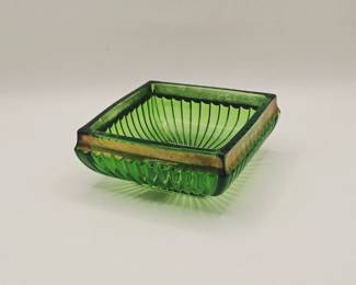 vintage green glass sugar bowl with gold trim. It is believed to be a product of the U.S. Glass Company and part of their "New York" pattern
