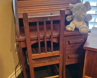 Small wooden roll top desk and chair for a child 
