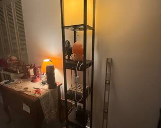Floor lamp with shelves and drawers