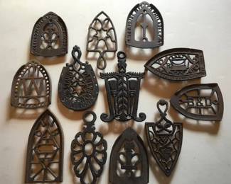 Antique iron trivets