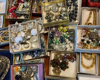 More clip on earrings.  Sets of jewelry.  