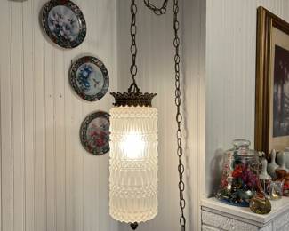 How about an antique glass hanging lamp?  We have four of different shapes, sizes and colors!
