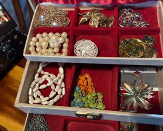 Bracelets.  Necklaces.  Brooches.