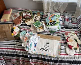 Unused kitchen kits and towels, tablecloths, theme napkins