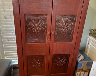 Red cabinet tin punched doors