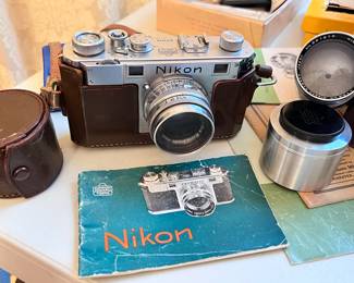 Nikon S  Rangefinder camera with 3 lens and case.