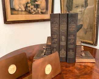 Bronze book slats and CURRIER and Ives