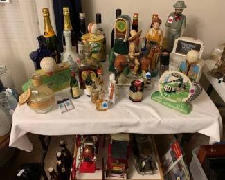 Alcohol bottles unopened and opened. Collector figures. For the baseball and golf lover and Western culture lover. Vehicles and more.