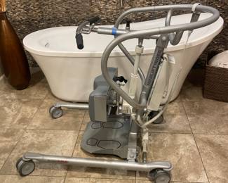 $495 Electric sit to stand with waist support pad