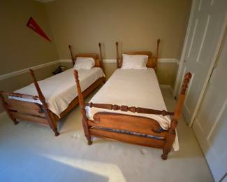 $495 Set of 2 Antique 4 poster twin bed with mattress and box spring included. Carved head boards with carved pineapple finish.